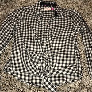 A flannel with a not in front